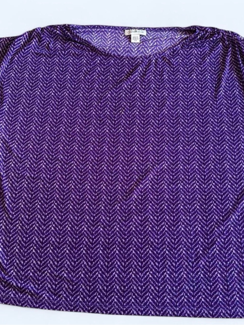 Women’s size large purple herringbone tunic by Jaclyn Smith. Spandex/Polyester.